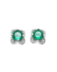 Pair of emerald and diamond tulip stud earrings crafted in 14k white gold.