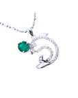 0.37 ct. emerald dolphin pendant necklace in 14K white gold with a deep green round emerald.