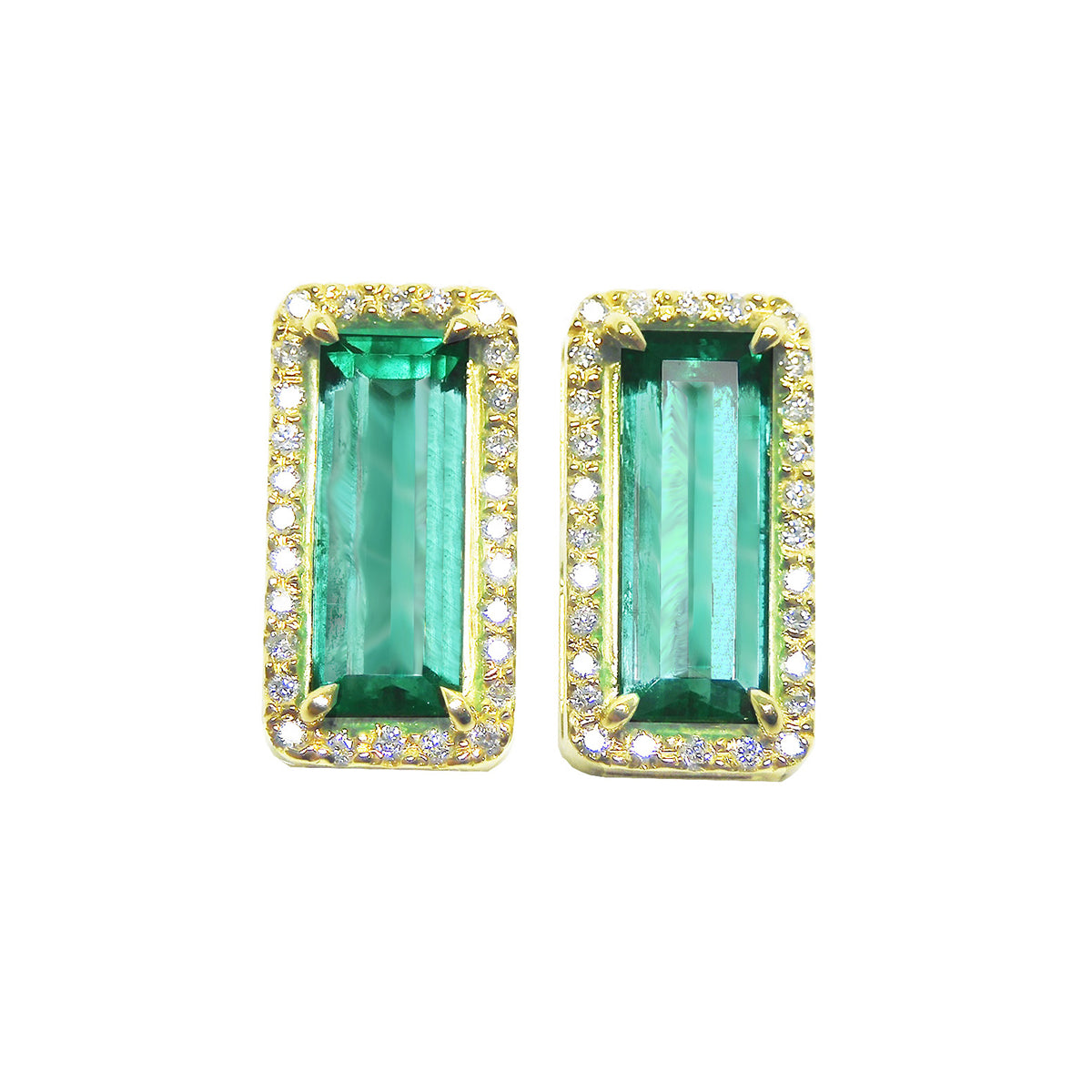Pair of natural emerald stud earrings with yellow gold frames halo diamond on a white background