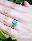 Three stone emerald ring for ladies
