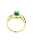 Natural Emerald GIA Certified Ladies Ring in 14K Gold. This women's ring showcases a Colombian emerald, F1 clarity, in a rich, medium-deep green.
