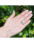Emerald GIA Certified Ladies Ring 14K Gold featuring a Colombian emerald graded F1, elegantly showcased on a woman's hand.