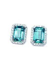 Pair of Muzo Colombian emerald stud earrings with halo diamond crafted in 14k white gold.