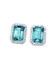 Pair of Muzo Colombian emerald stud earrings with halo diamond crafted in 14k white gold.