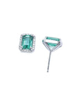 1.74 carat natural emerald-cut stud earrings with halo diamonds in 14K white gold.