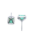 14K white gold emerald-cut stud earrings with vibrant bluish-green emeralds and a diamond halo.
