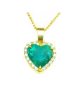 5.04 ct. emerald heart pendant with diamond halo in 18K yellow gold on a gold chain.