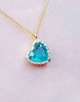 Emerald Muzo Colombian necklaces for sale tilted heart shaped halo natural diamond handcrafted in 18k yellow