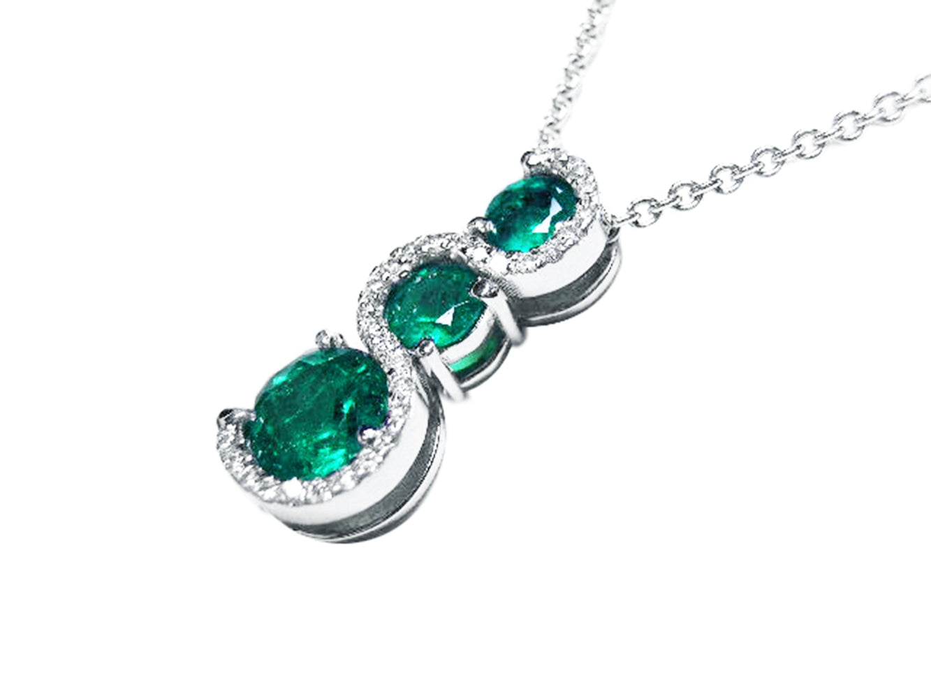 The journey style pendant necklace with three round cut natural colombian emeralds displaying its top and side profile view.