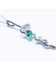 May birthstone emerald love pendant necklace in 14k white gold.