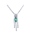 Marquise cut Colombian emerald necklace in 14K white gold with diamond links and dangling diamond accents.