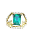 Emerald May birthstone ring for women in 18k yellow gold with natural diamonds.