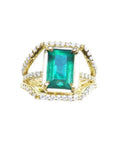 Emerald May birthstone ring for women in 18k yellow gold with natural diamonds.