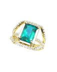 Emerald engagement ring: 2.86 ct. green emerald in 18K yellow gold with three rows of diamonds.