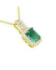 Natural Colombian emerald necklace halo diamond crafted in 14k yellow gold