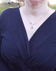 Ladies' Emerald necklaces for sale natural pear cut sparkling medium green color 1.73 carats with accent diamonds