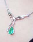 Muzo Colombia Emerald necklace natural pear cut sparkling medium green color 1.73 carats with accent diamonds