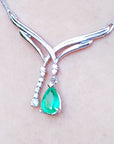 Emerald necklaces for women in USA natural pear cut sparkling medium green color 1.73 carats with accent diamonds