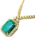 14k Yellow gold Emerald necklace emerald-cut natural emerald deep green bluish color, encircled by a halo diamond