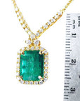 May's birthstone Emerald necklaces emerald-cut natural emerald deep green bluish color, in a halo diamond high quality