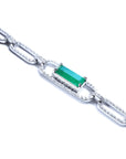 Paperclip style bracelet with an emerald-cut natural emerald crafted in 14k whit gold.