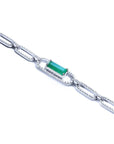 14K white gold paper clip bracelet with a rectangular emerald center stone surrounded by diamonds.