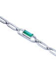 14K white gold paper clip bracelet with a rectangular emerald center stone surrounded by diamonds.