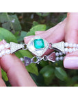 Pearl bracelet with a square natural colombian emerald and diamonds crafted in 18k white gold.