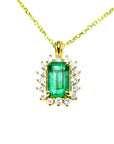 Gold necklace with a rectangular natural colombian emerald with halo diamond pendant on a topside position view.