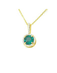 Round cut Colombian emerald pendant necklace with halo diamonds in 14K gold.