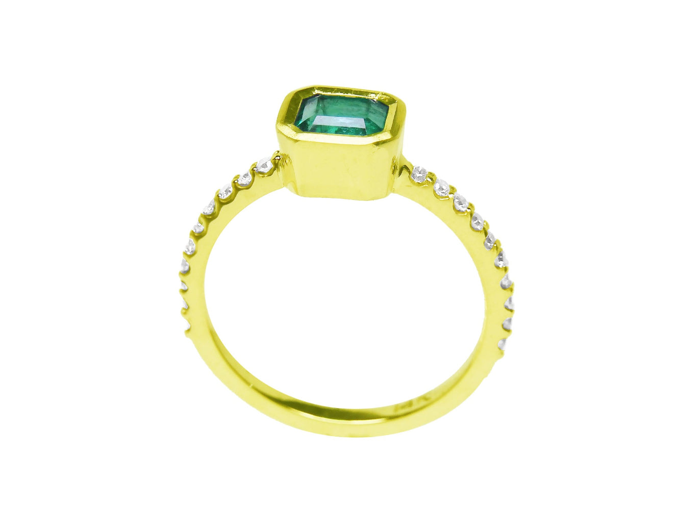 A yellow gold emerald ring displaying the top and lateral side view.