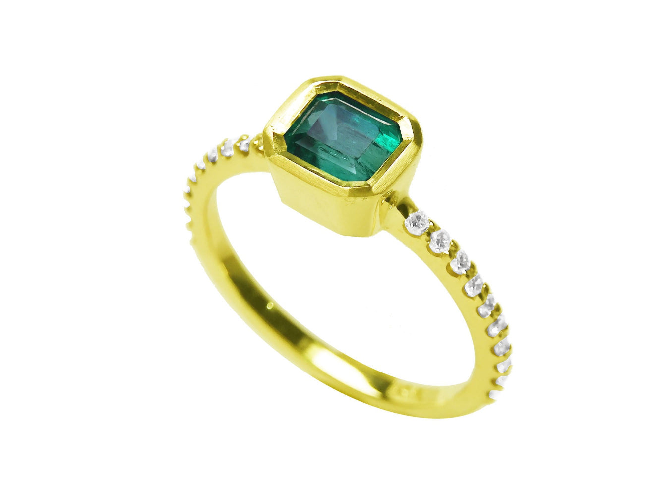 This bezel set natural colombian emerald ring displays the top and accent diamonds on the band design.