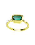 14K yellow gold east-west emerald ring, bezel set rectangular emerald, diamond accents.