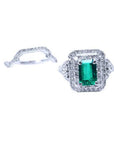 1.01 carat emerald ring with double halo diamonds and matching diamond band in 14K white gold.