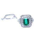 1.01 carat emerald ring with double halo diamonds and matching diamond band in 14K white gold.