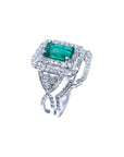 1.01 carat emerald ring with double halo diamonds and matching band in 14K white gold.