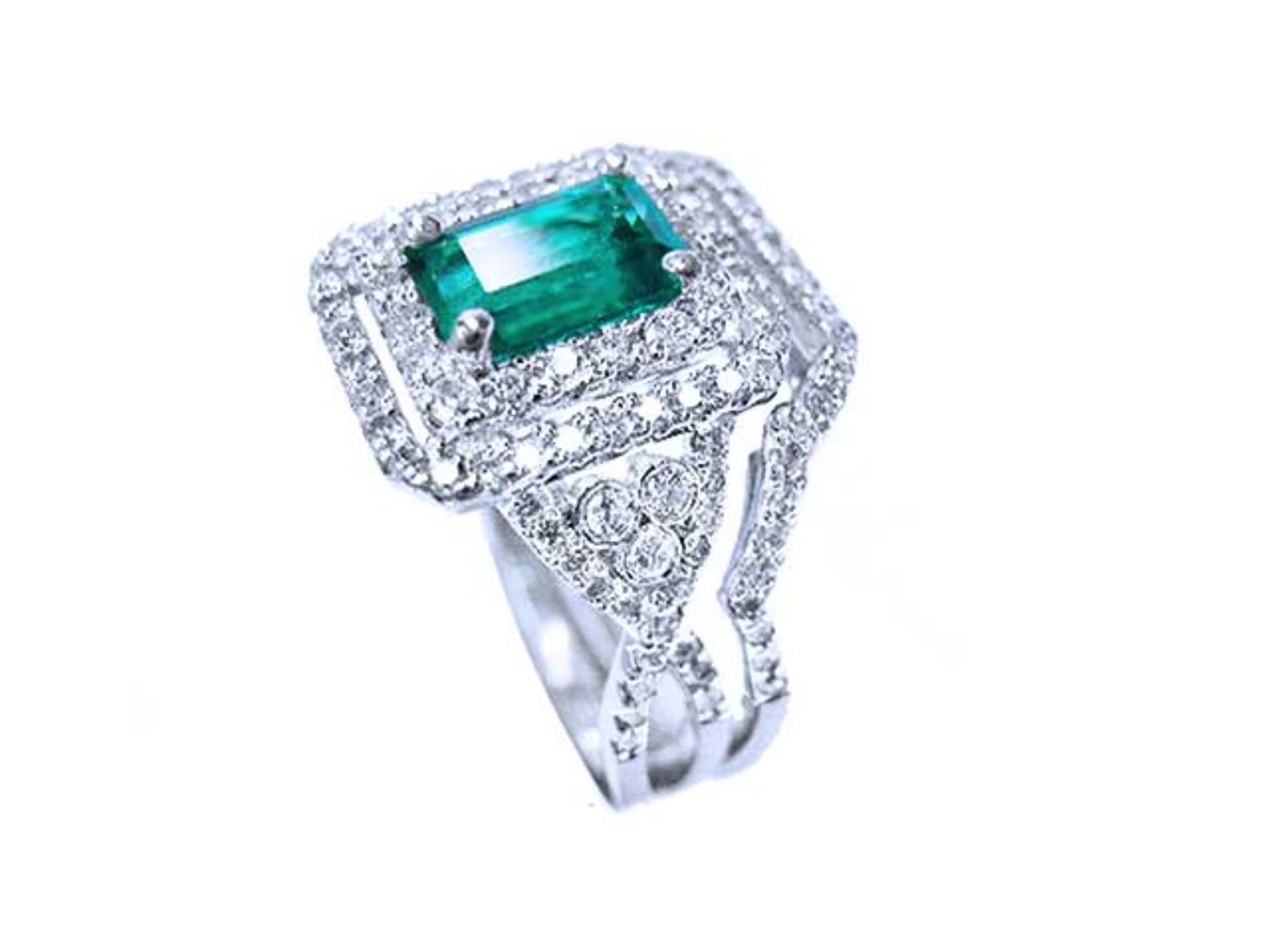 A Muzo born real colombian emerald with halo diamond ring top and side profile view
