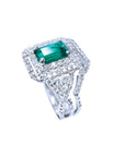 1.01 carat emerald ring with double halo diamonds and matching band in 14K white gold.