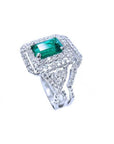 1.01 carat emerald ring with double halo diamonds and matching band in 14K white gold.