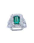 Natural Colombian emerald ring with double halo diamonds and matching band 14k white gold.