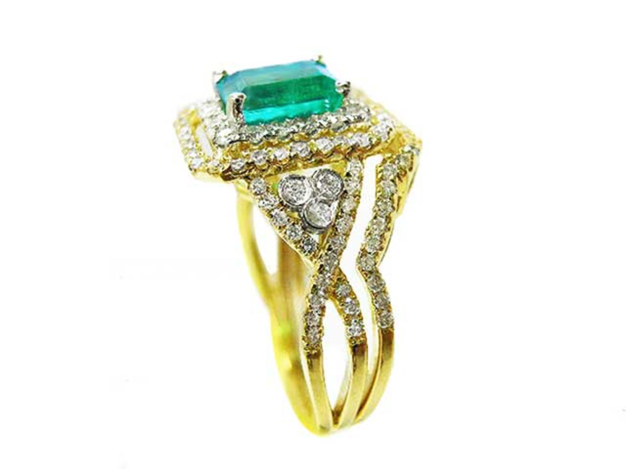 Side profile of a yellow gold emerald and matching band ring with accent diamonds, top gemstone and side bands profile visibles.