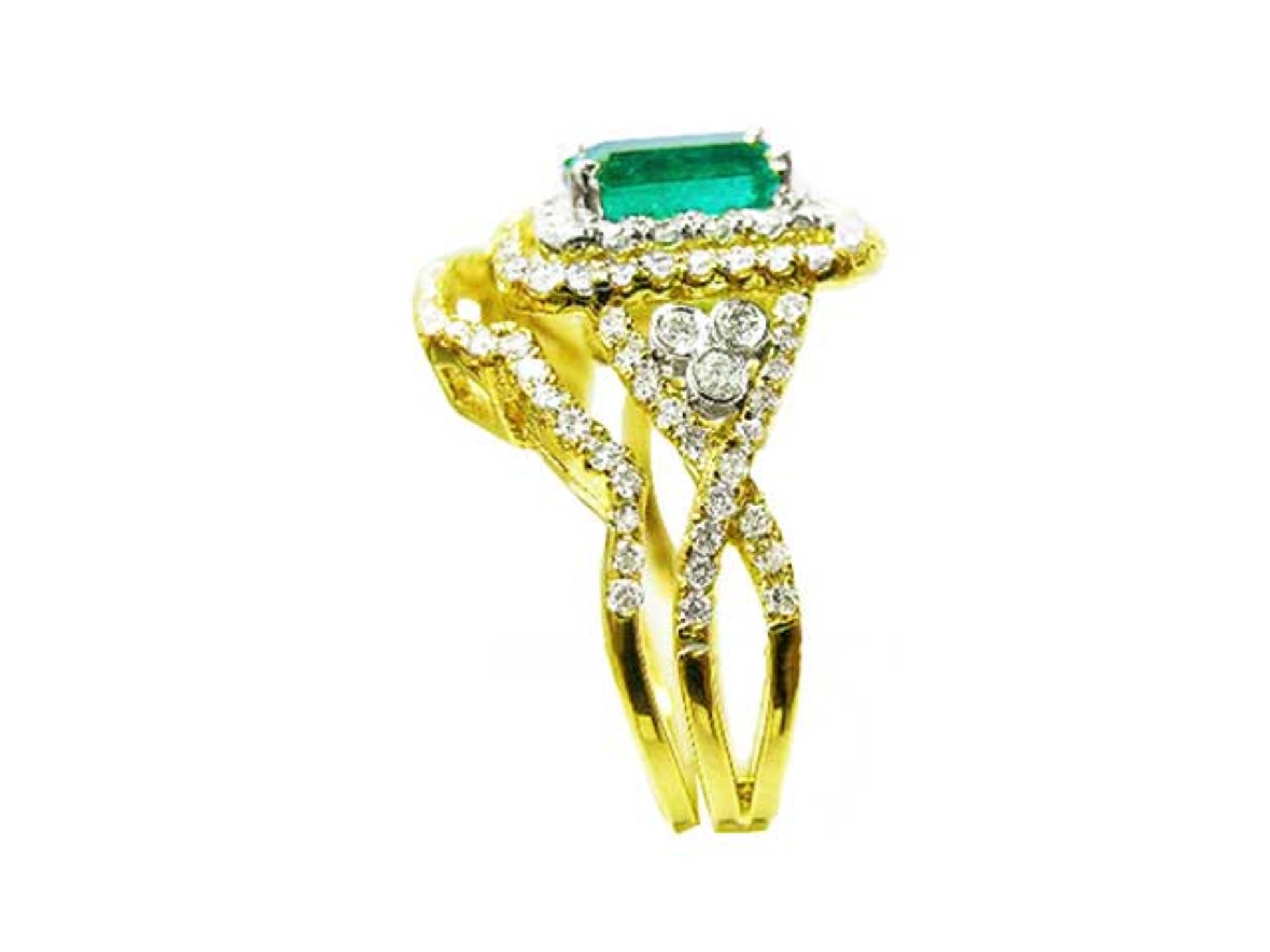 A side profile view of a natural emerald ring with the matching band and accent diamonds in yellow gold.