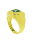 The half side position of this natural colombian emerald ring for men shows the top setting and band design.
