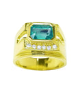 Men's 18K yellow gold ring with a rectangular emerald gemstone and five small diamonds.
