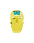 A clear display of this yellow gold emerald ring for men showing the top and side band profile.