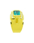 A clear display of this yellow gold emerald ring for men showing the top and side band profile.