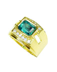 Men's 18K yellow gold ring with a rectangular emerald and surrounding diamonds.