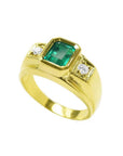 18K yellow gold men's ring with a bezel-set Colombian emerald and two prong-set side diamonds.