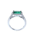 1.21 ct. emerald-cut emerald ring with natural diamonds set in 14K white gold.