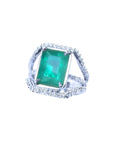 Emerald-cut 3.90 ct natural bluish-green emerald ring with triple diamond rows in 14K white gold.
